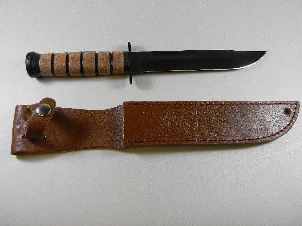 Knife USMC with Leather Scabbard. NORTHRIDGE INTERNATIONAL INC.