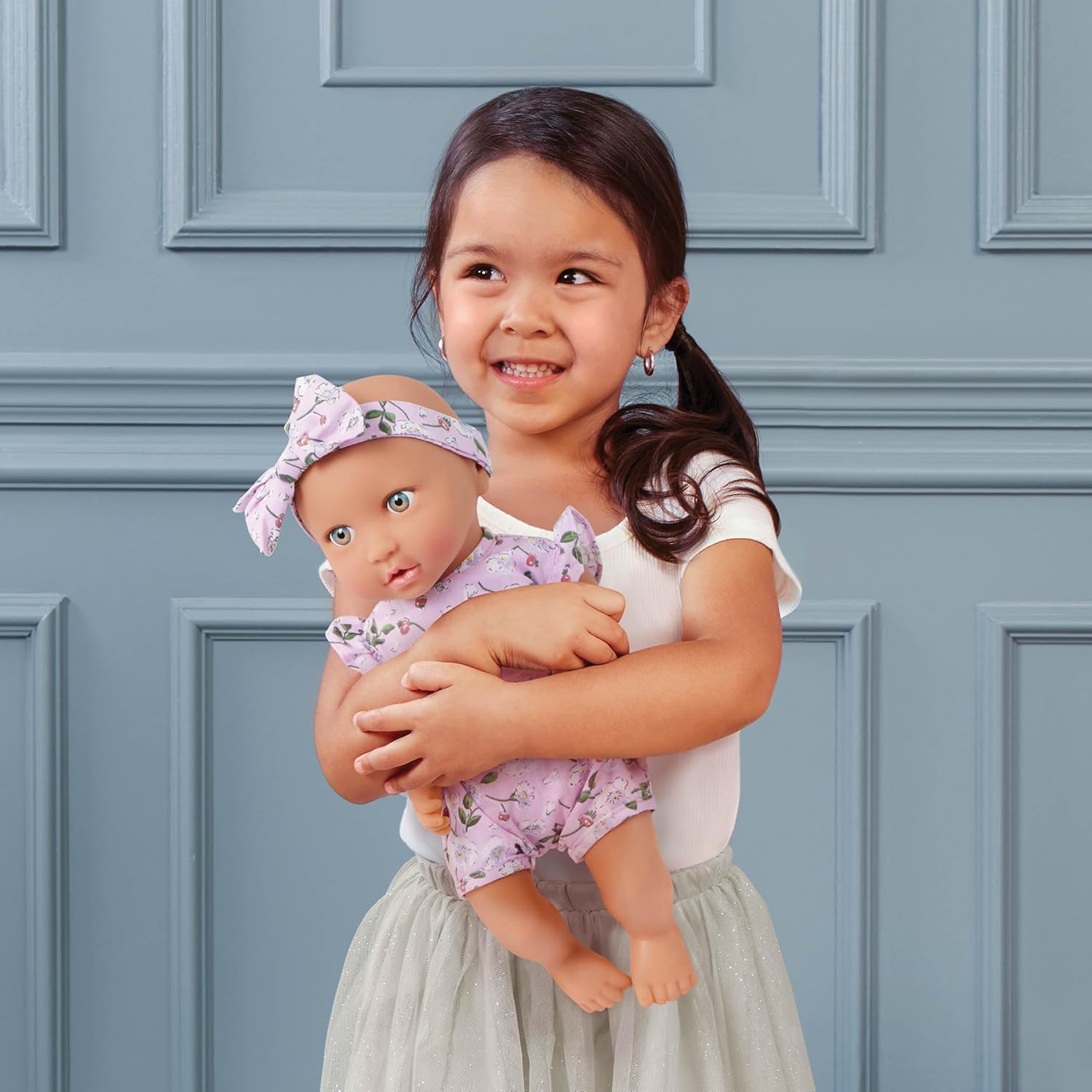 LullaBaby – 14-Inch Realistic Baby Doll – Brown Eyes & Soft Body – Clothing Floral Sleeper, Headband & Pacifier – Plush Bassinet Bed – Pretend Play 2+ Years – Floor Pillow Set