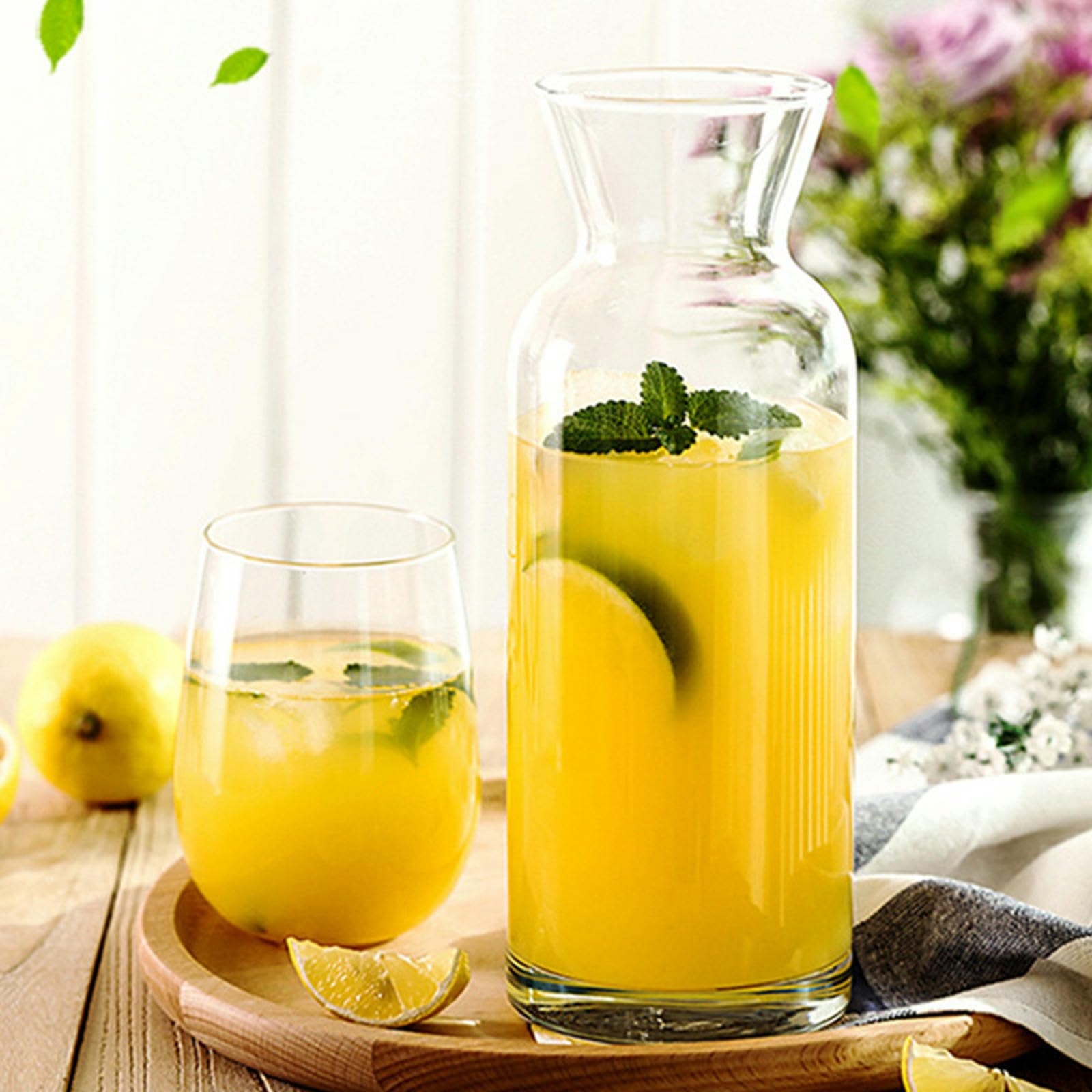 Le bottiglie di succo di frutta fresche e squisite per uso domestico sono pratiche e fresche con resistenza alle alte temperature, grandi 1000 ml