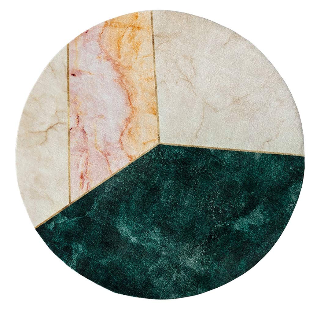 Tapis de salon rond design géométrique pour créer un coin lecture cocooning dans la chambre