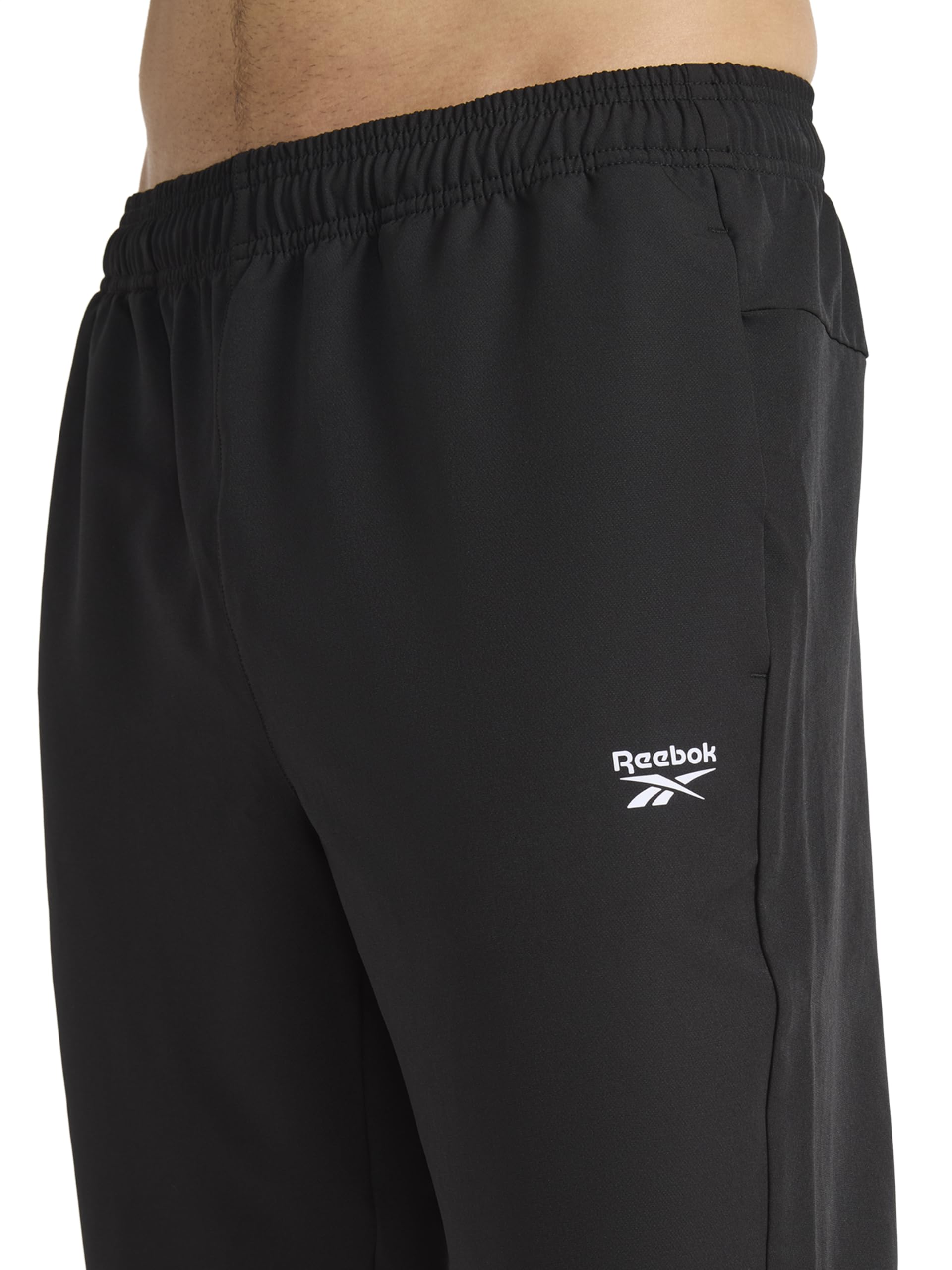 Reebok Herren Hose Repeat Woven Pant, Standard Fit, 30” Inseam, Lightweight Stretch Poly-Blend Fabric