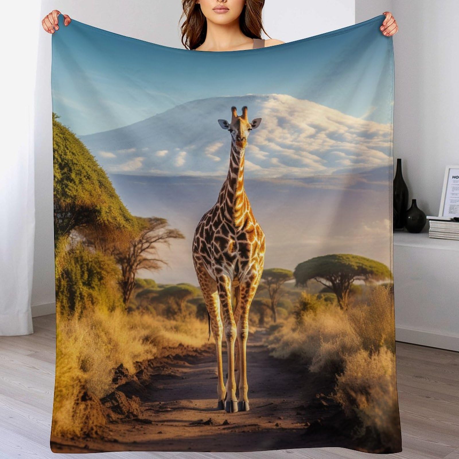 Couverture polaire girafe idéale pour vos soirées cocooning sur le canapé