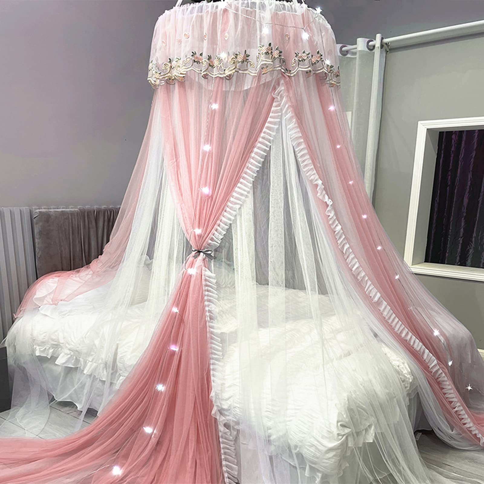 Lit d'enfant auvent moustiquaire de luxe en dentelle rose avec illuminations féeriques