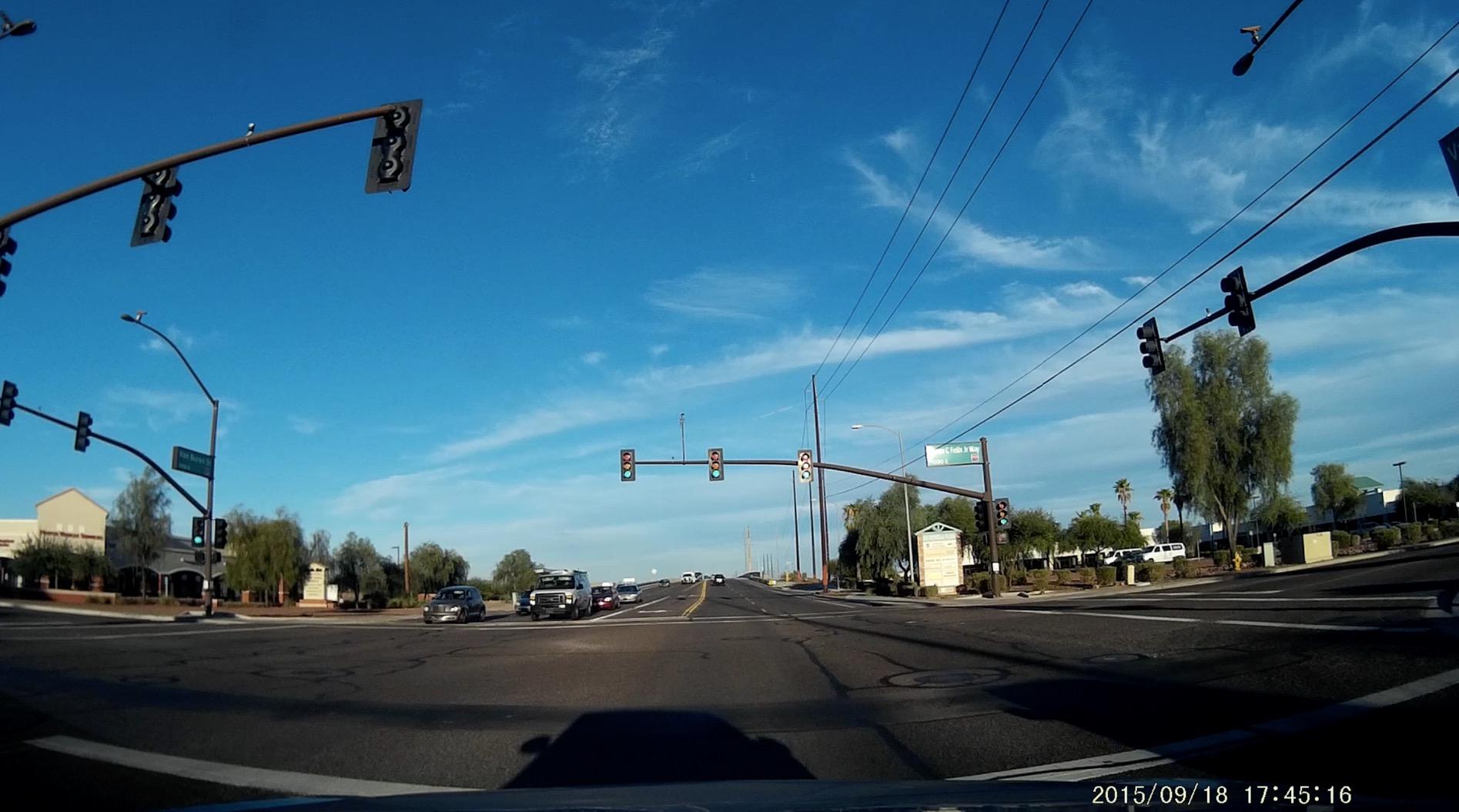 Rexing V1 sample footage frame showing road ahead
