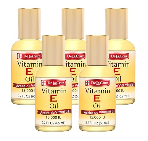 De La Cruz Aceite de vitamina E, aceite de vitamina E con cártamo para piel, cabello, cara y cuerpo, 2.2 onzas líquidas (5 botellas)