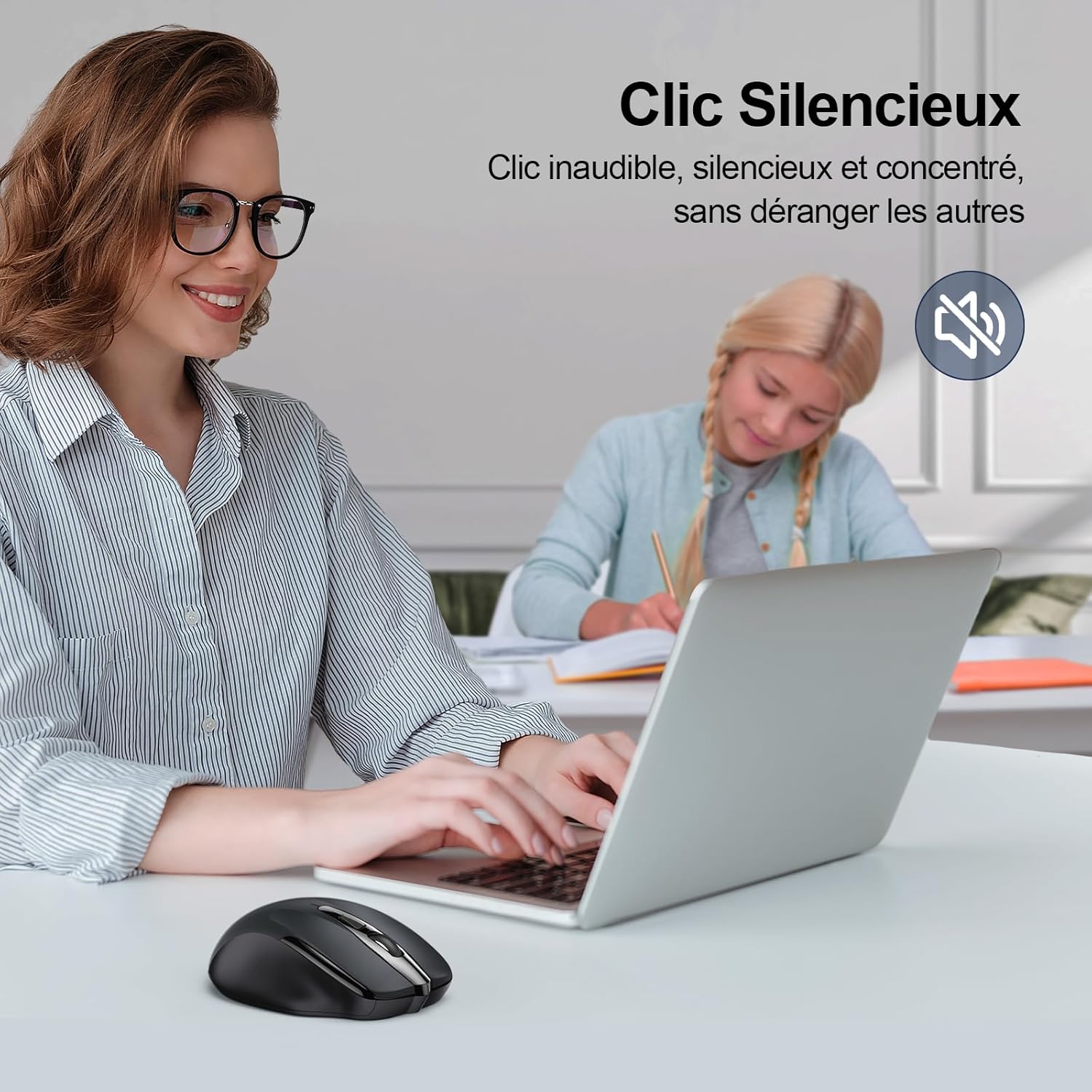 Person using the silent click mouse in a quiet environment