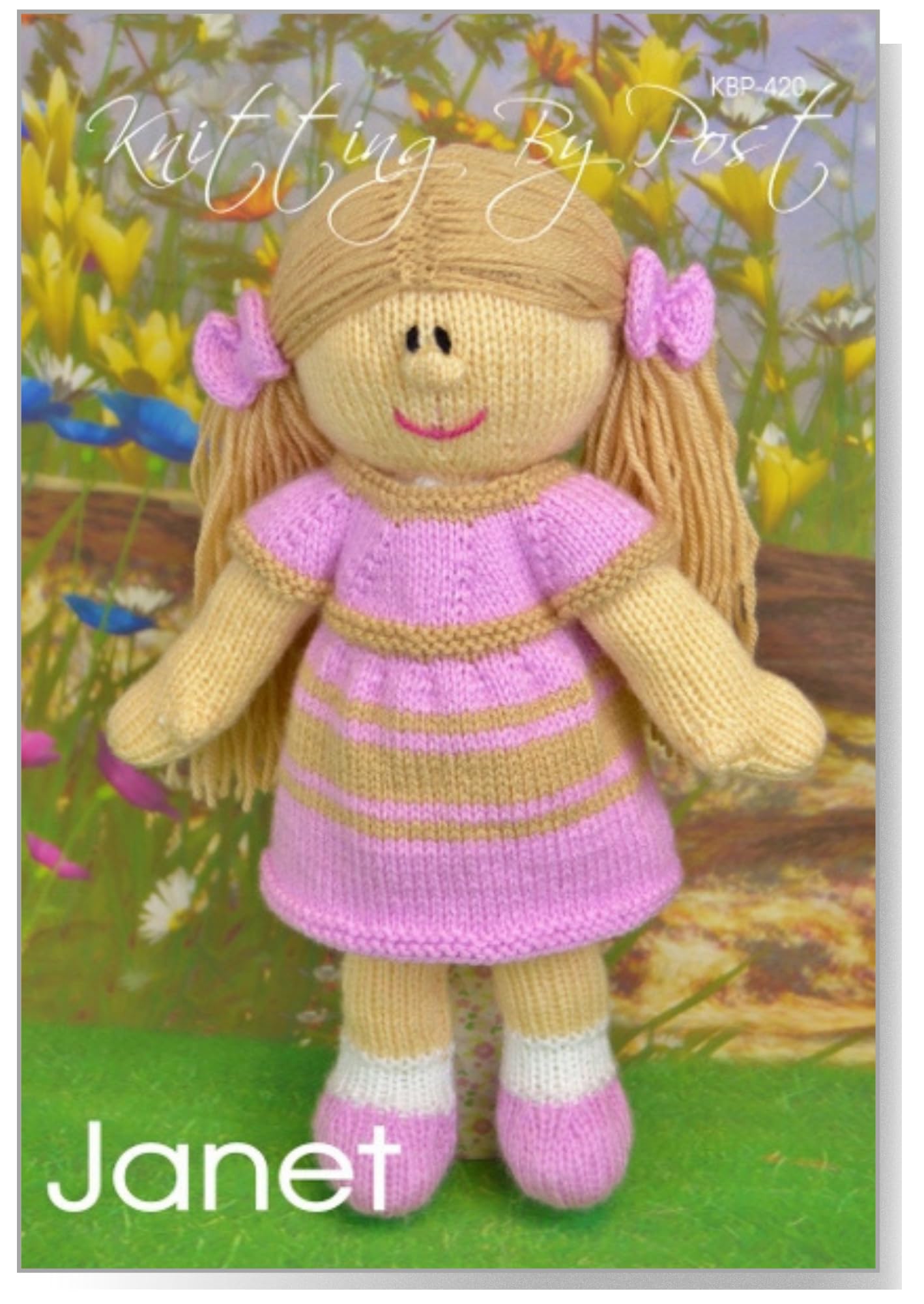 Knitting Pattern Janet the Dolly from Knitting by Post - Our Cute Looking Doll with a Removable Dress is Ready to be Knit in Brown, Pink and White