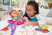 Vista 2 de Polly Pocket Flamingo Party - Juego grande y compacto con 26 sorpresas (incluyendo muñecas Micro Margo y Friend), función Pop & Swap, zonas de juego