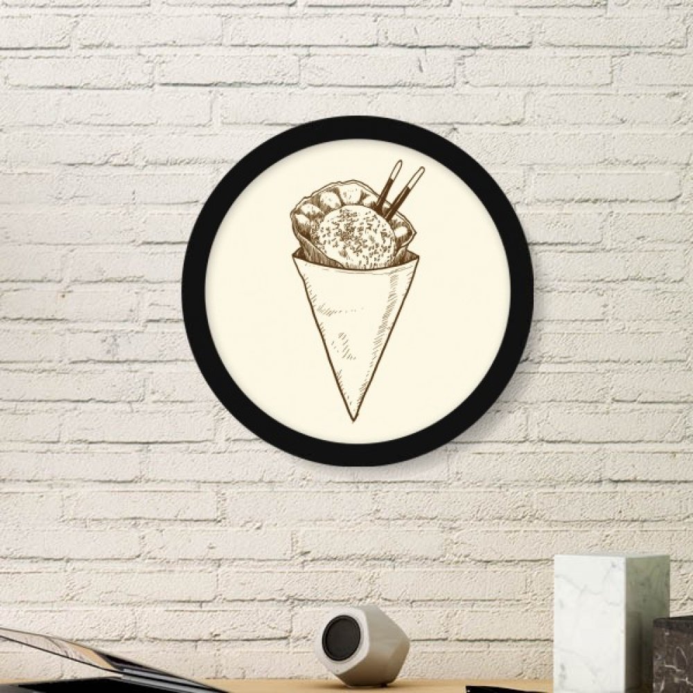 Cadre photo rond bois noir pour briser la monotonie des murs blancs