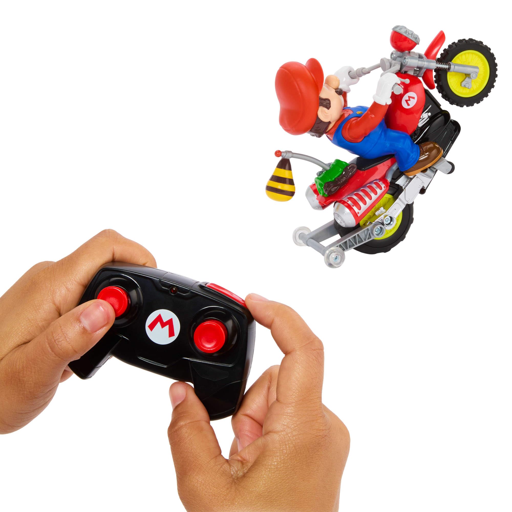 Hot Wheels Mario Wheelie Motocross RC, ferngesteuertes Motorrad | Batteriebetriebenes Motorrad mit Figur, bewegt und neigt sich in den Kurven, inspiriert vom Super Mario Bros. Film, JML15