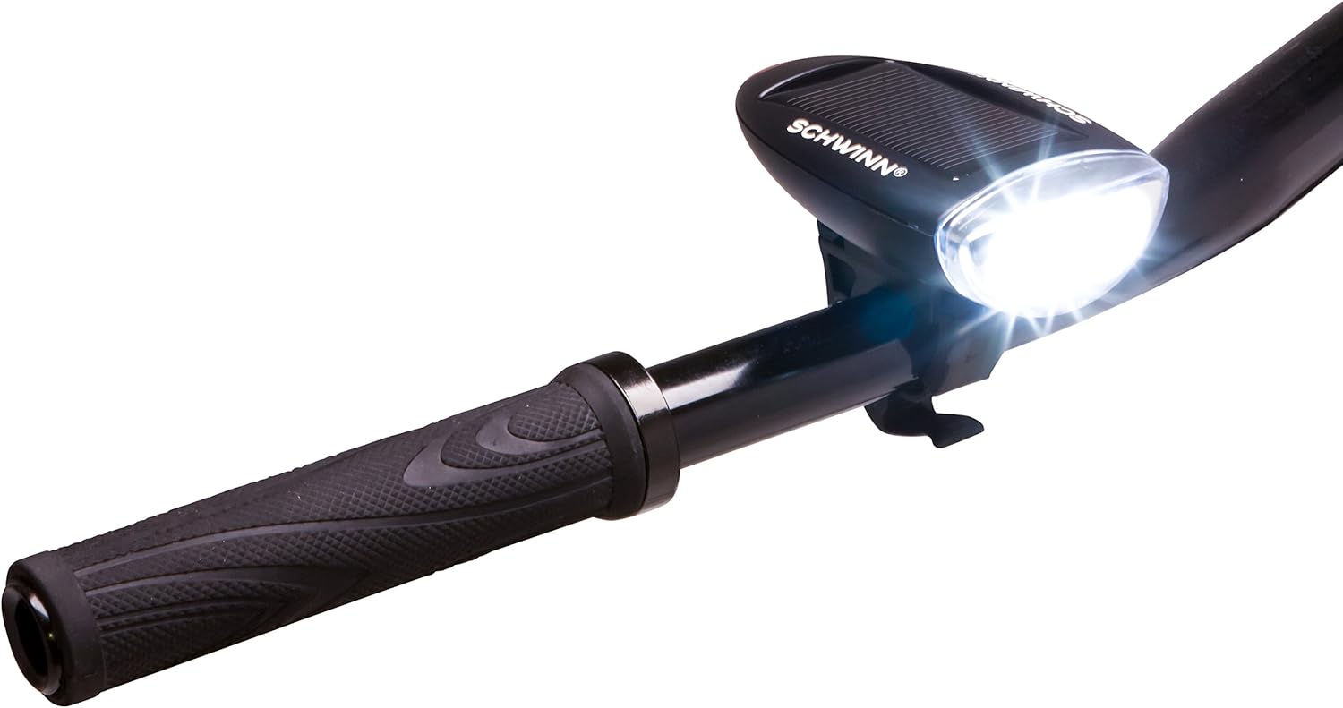 Schwinn LED Headlight mounted on a bicycle handlebar