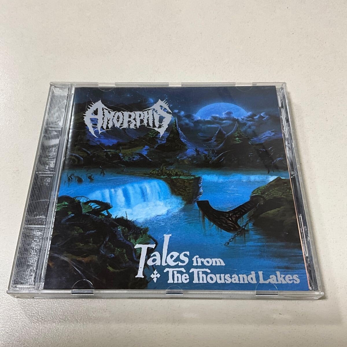 Amazon.co.jp: 北欧デスメタル AMORPHIS TALES FROM THOUSAND