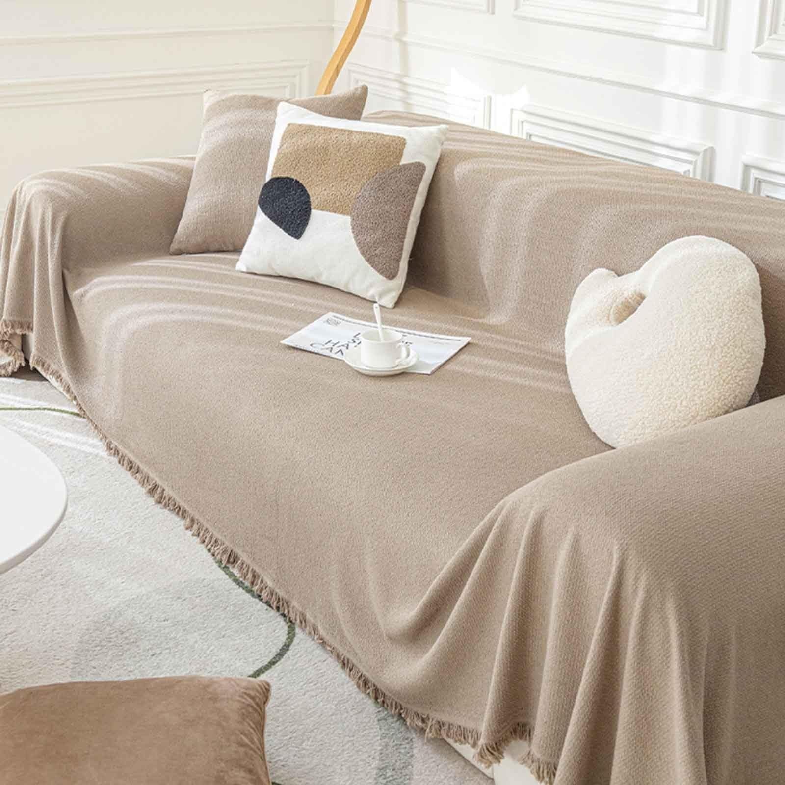 Jeté de canapé en laine Konsilsa 180x260cm avec pompons pour grand canapé 3 places