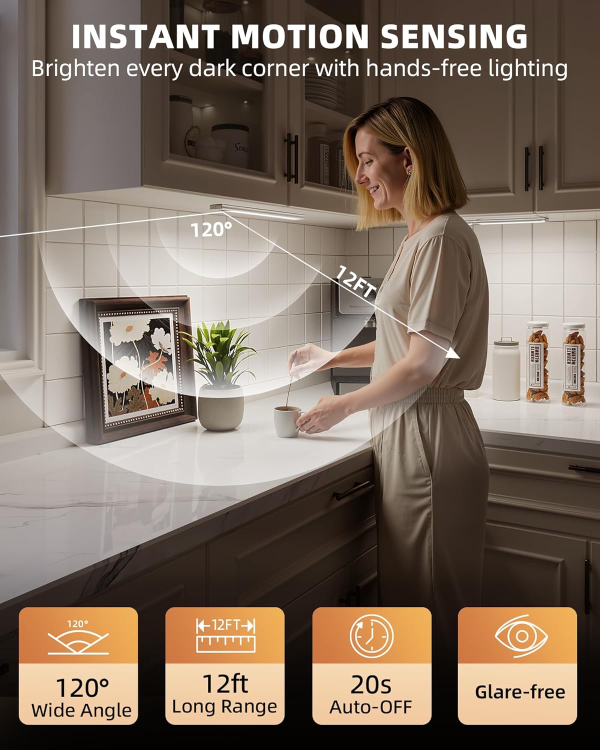 Woman standing at a kitchen counter with under cabinet lights on, illustrating the 120-degree wide angle and 12ft long range motion sensing.