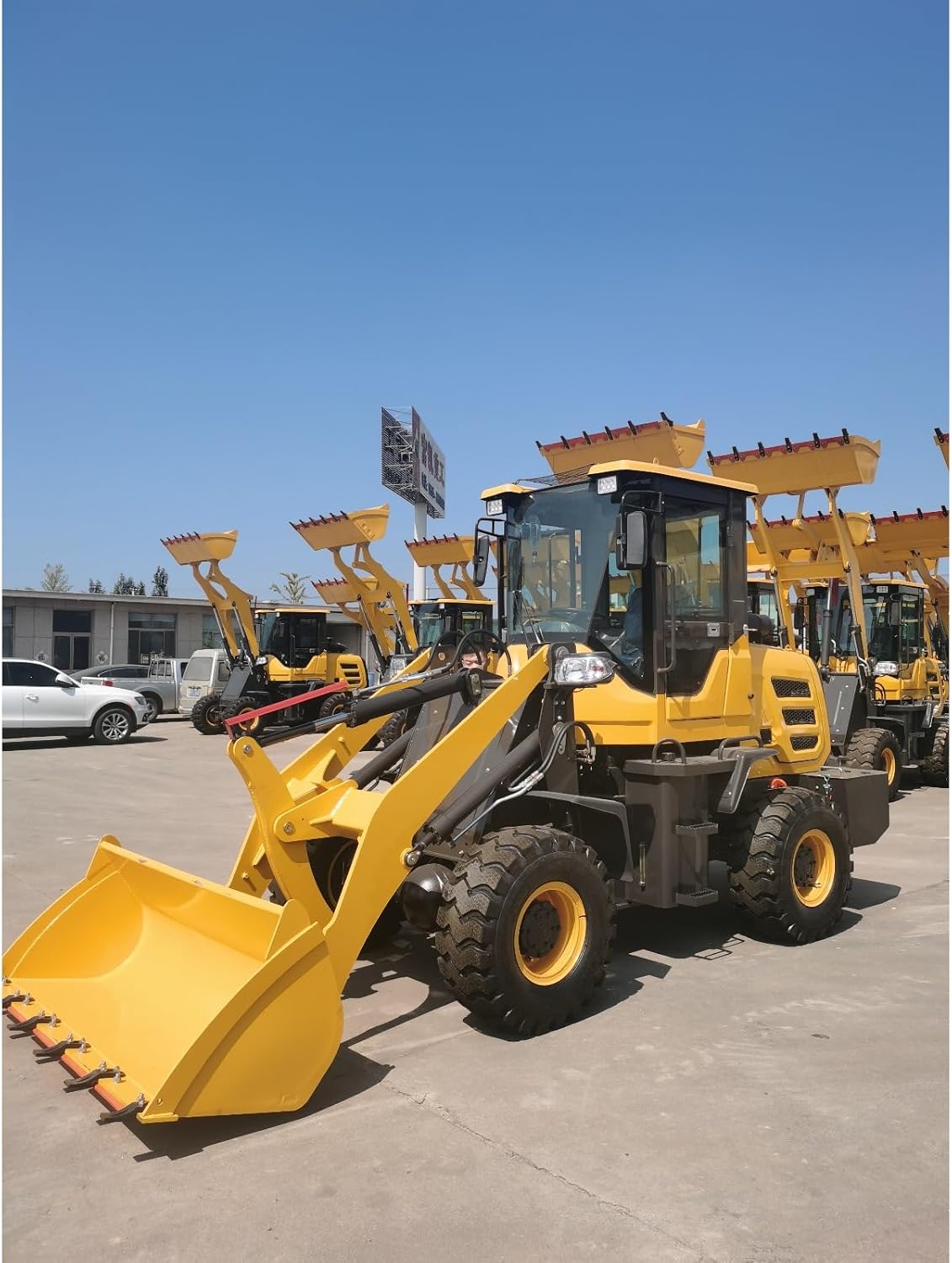 Wheel Mounted Front Loader Compact Utility Machine for Material Moving Landscaping Projects and Job Site Management with Smooth Operation and Stable Performance for Consistent Results