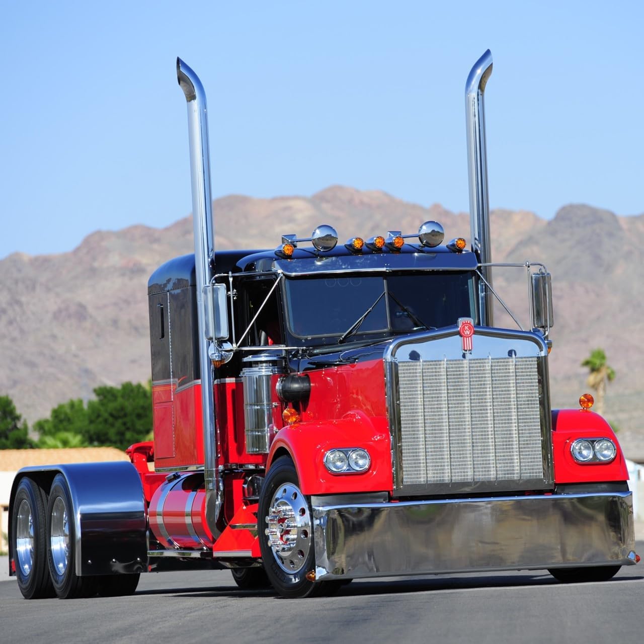 Red semi-truck with polished aluminum wheels