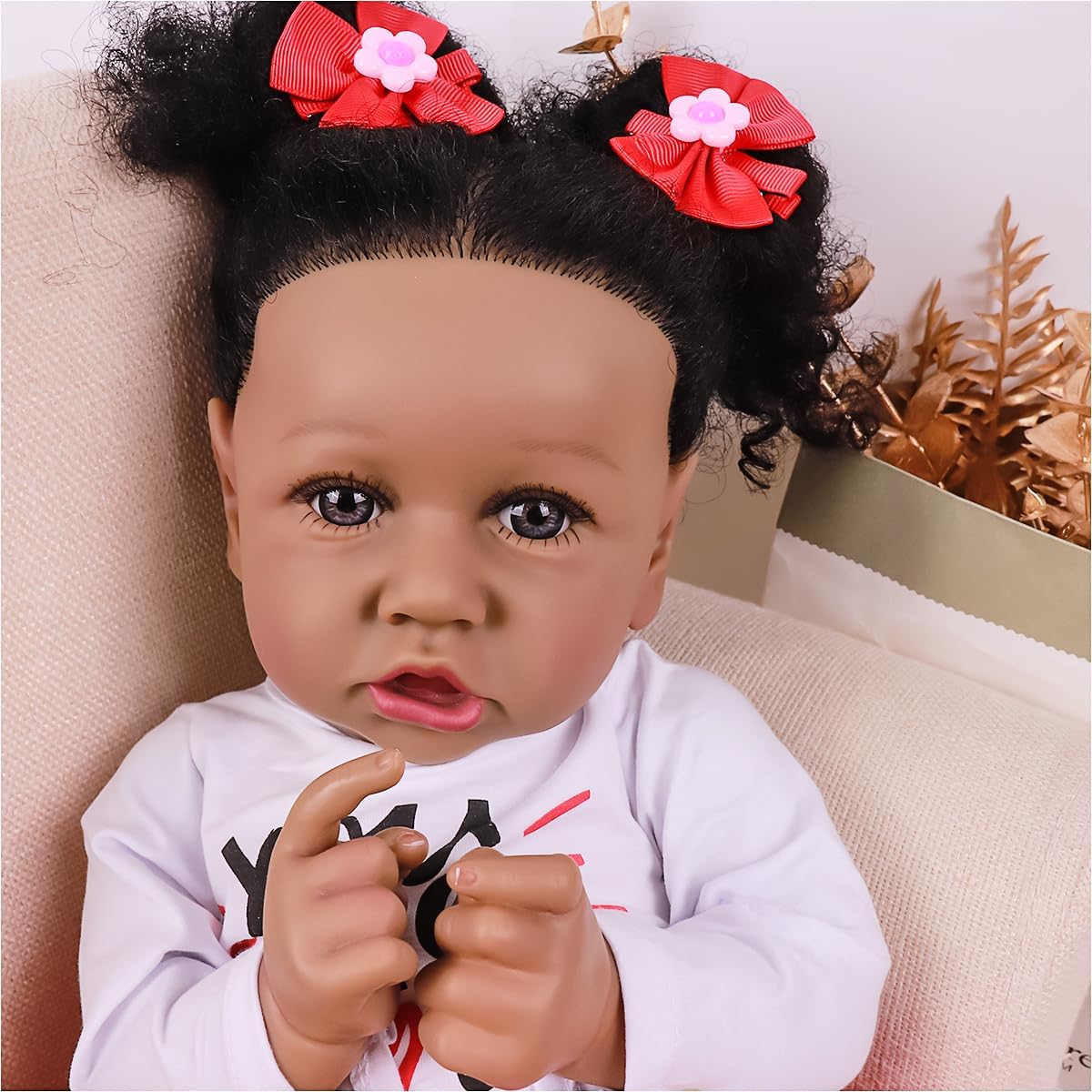 Lifelike Black Reborn Baby Dolls 22 Inch Baby Soft Body Realistic Newborn Baby Dolls African American Real Life Baby Dolls Cloth Body Doll Toy Gift for Kids Age 3+