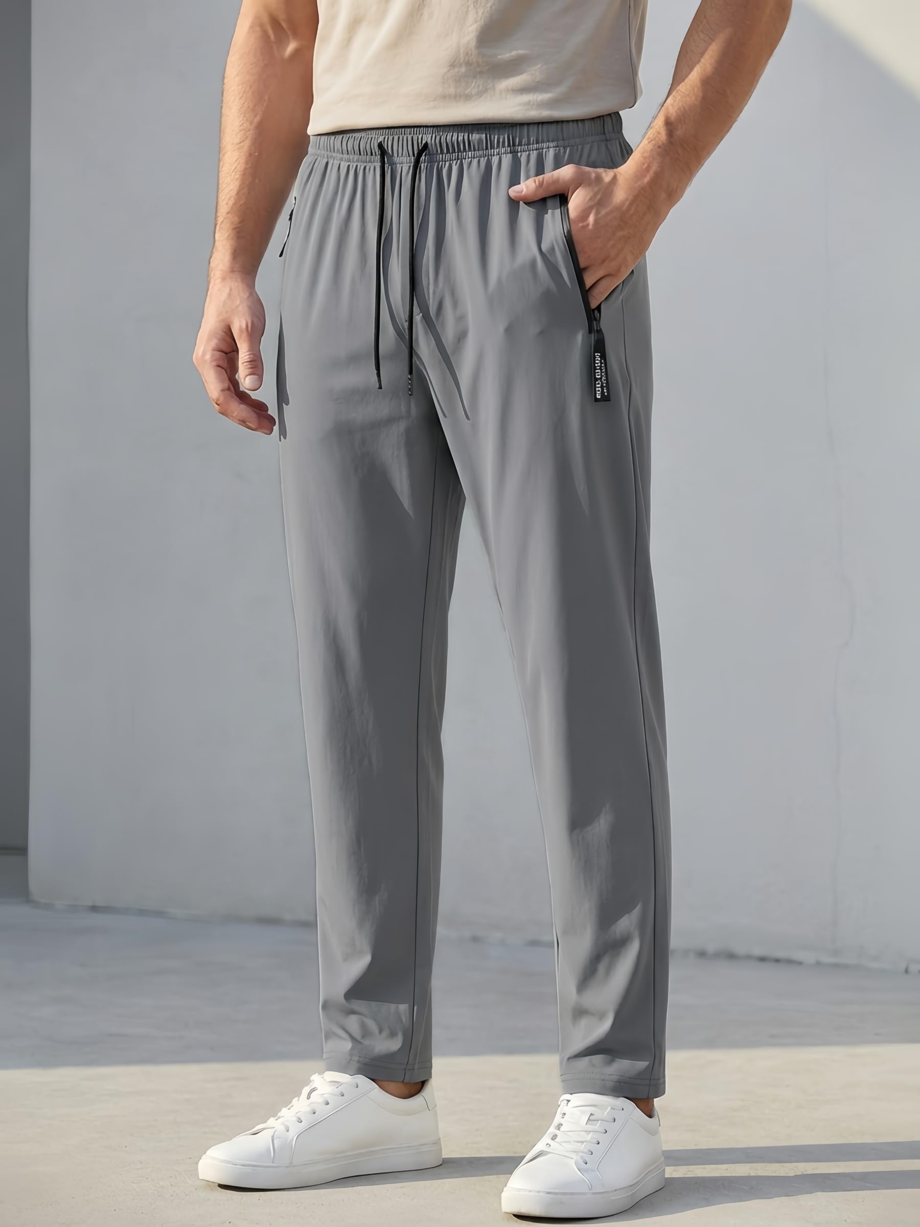Pantalones deportivos para hombre, pantalones deportivos ligeros de secado rápido con cintura elástica y bolsillos con cremallera