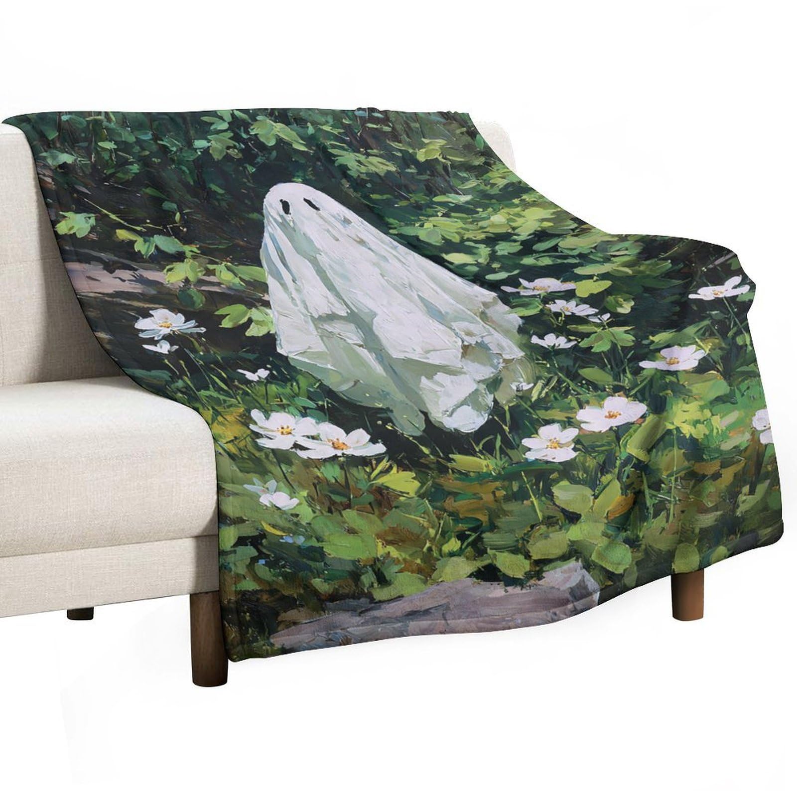 Couverture motif fantôme confortable pour vos soirées cocooning au salon