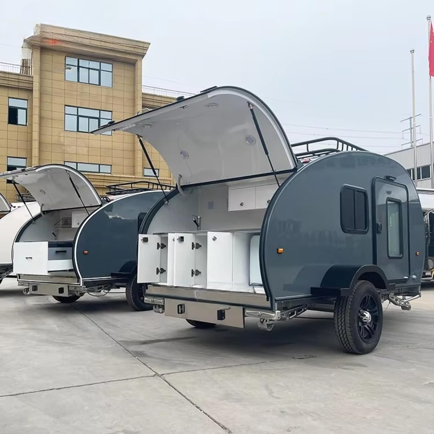 Mobile Travel Camper Trailer, Fully Equipped with Sleeping Area, Kitchen, Bathroom, Storage and Living Space for Camping, Outdoor Trips and Adventures