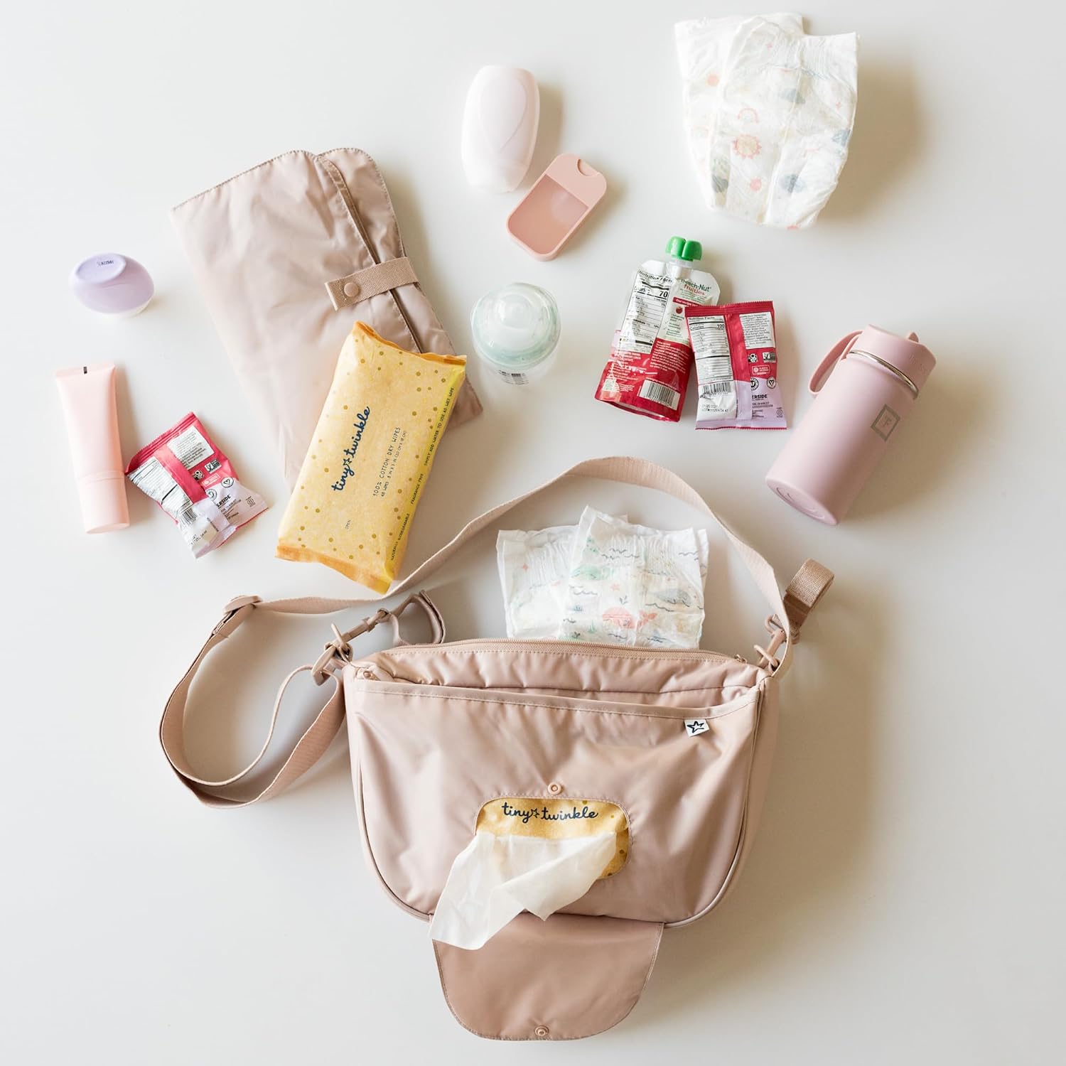 Tiny Twinkle Crossbody Diaper Bag with Portable Changing Pad | Easy Access Wipes Pocket with Multiple Compartments for Bottles, Diapers and Snacks | Waterproof and Easy to Clean (Beige)