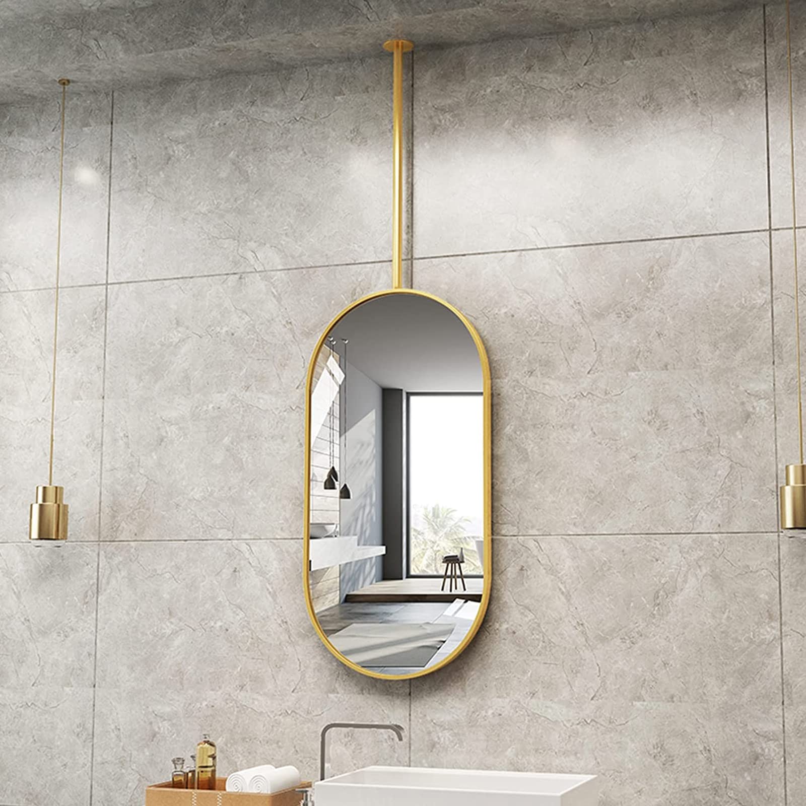 Miroir ovale haut de gamme monté sur tige dorée et cadre en métal transparent