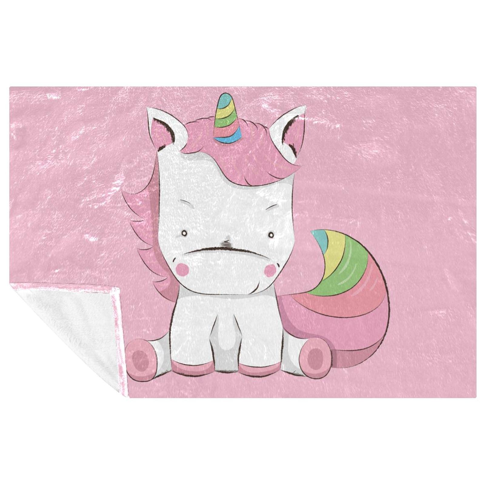 Couverture licorne rose chaude contre le froid sur lit ou canapé