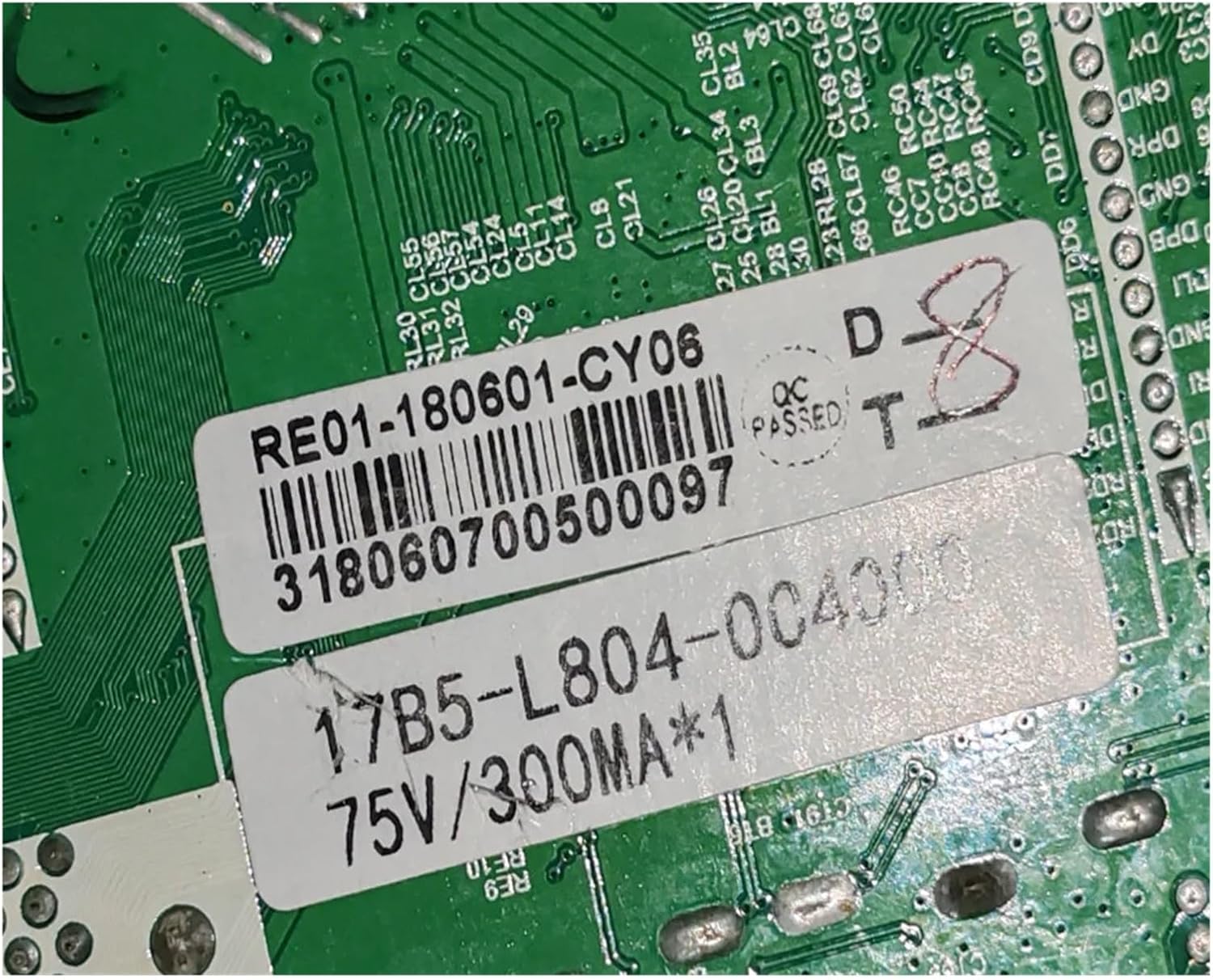 Close-up of labels on the back of the motherboard