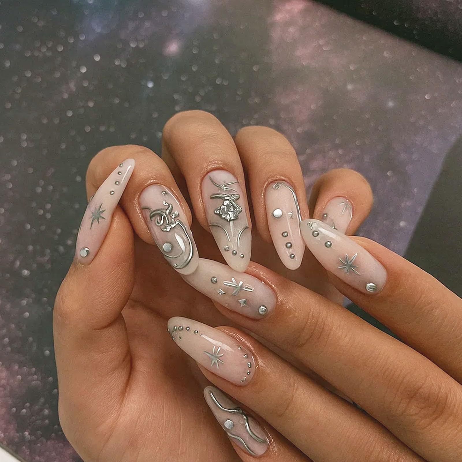 Glossy Elongated Stiletto False Nails With Intricate Silver Detailing And Sparkling Rhinestones - Image 2