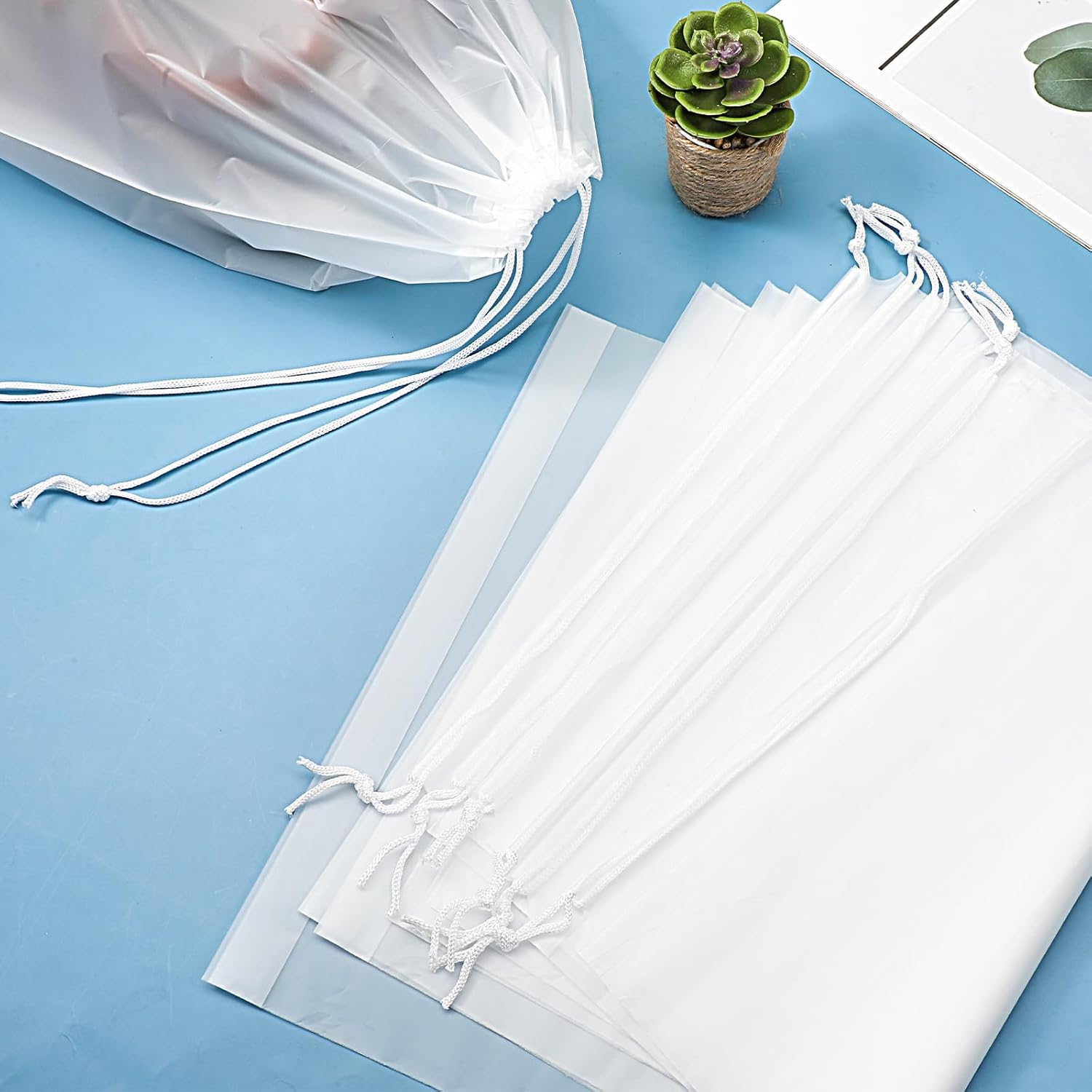 100 Pack Plastic Drawstring Bags Large Clear Shoe Bags for Storage Waterproof Dustproof Portable Shoe Storage with Rope for Packing,Men and Women, 15.7 x 11.8 inches - Image 3
