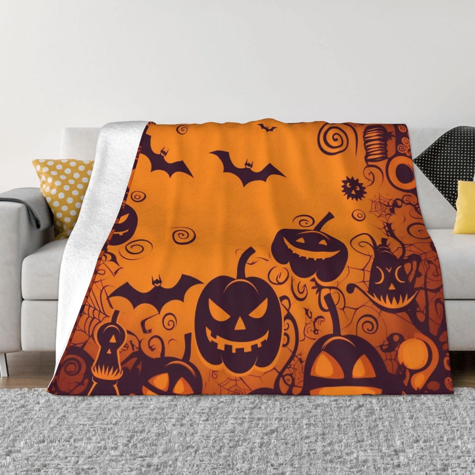 Couverture polaire Halloween orange pour des soirées frissonnantes et cocooning sur le canapé