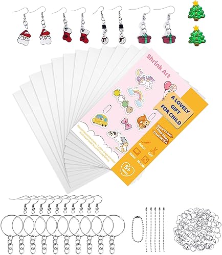 Rawskro El kit de hojas de plástico retráctil de 155 piezas incluye 30 piezas de papel de arte retráctil con 125 accesorios para llaveros, crea tus