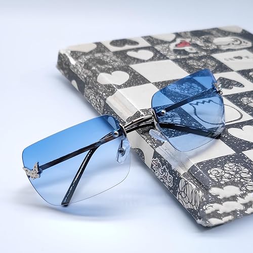 Vista 7 de Lentes de sol Y2K sin montura para mujeres y hombres, lentes teñidos de los años 2000, lentes de sol de mariposa
