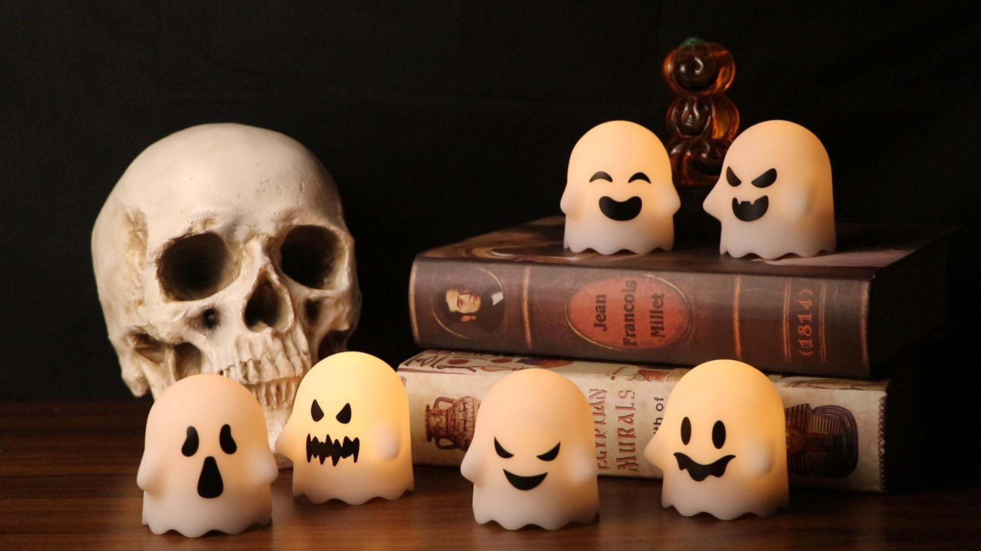 Image of Eldnacele Ghost Flickering Flameless Candles with Remote & Timer,Battery Operated Warm Light White Plastic LED Candles Set of 6 for Halloween Indoor Spooky Face Ambiance Decor(2x2 .4Inches)
