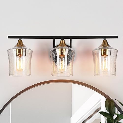 KSANA Lámpara de tocador negra y latón, moderna lámpara de baño de oro negro con pantalla de vidrio semillado, iluminación de baño de 3 luces sobre