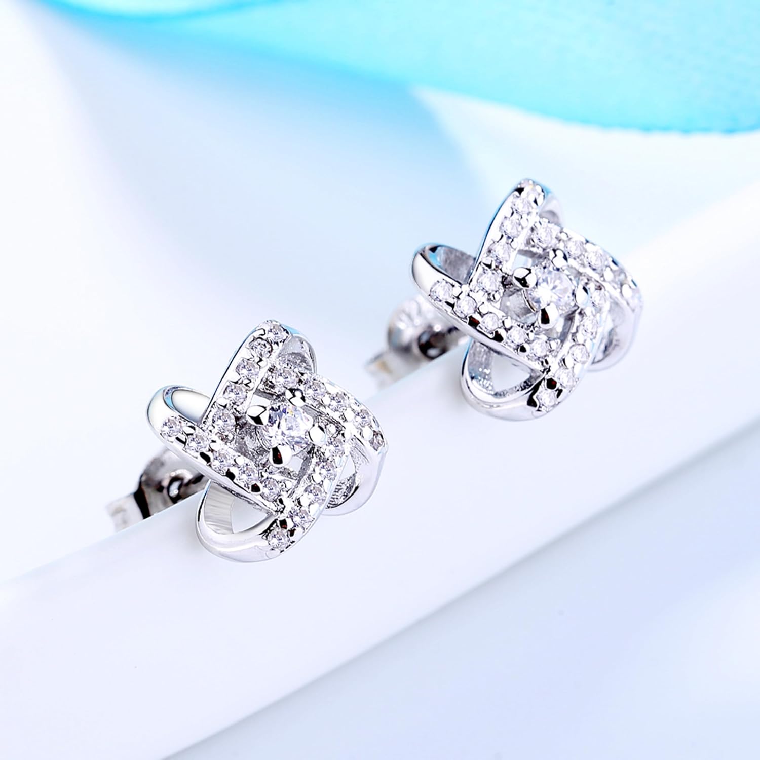 Sterling Silver Love Knot Stud Earrings with crystals - Image 2