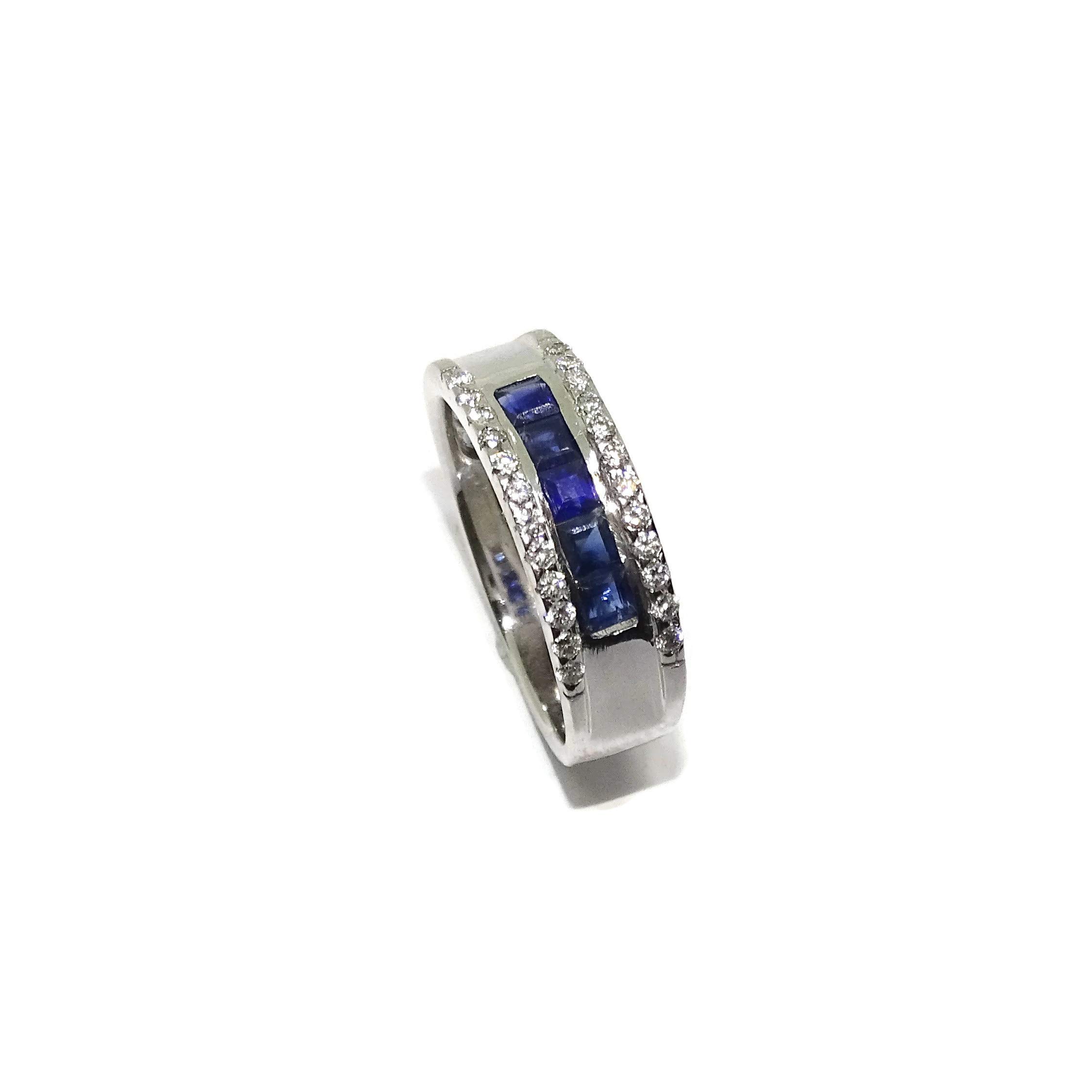 Anillo de oro blanco de 18k con 0.15cts de diamantes y 0.78cts de zafiros