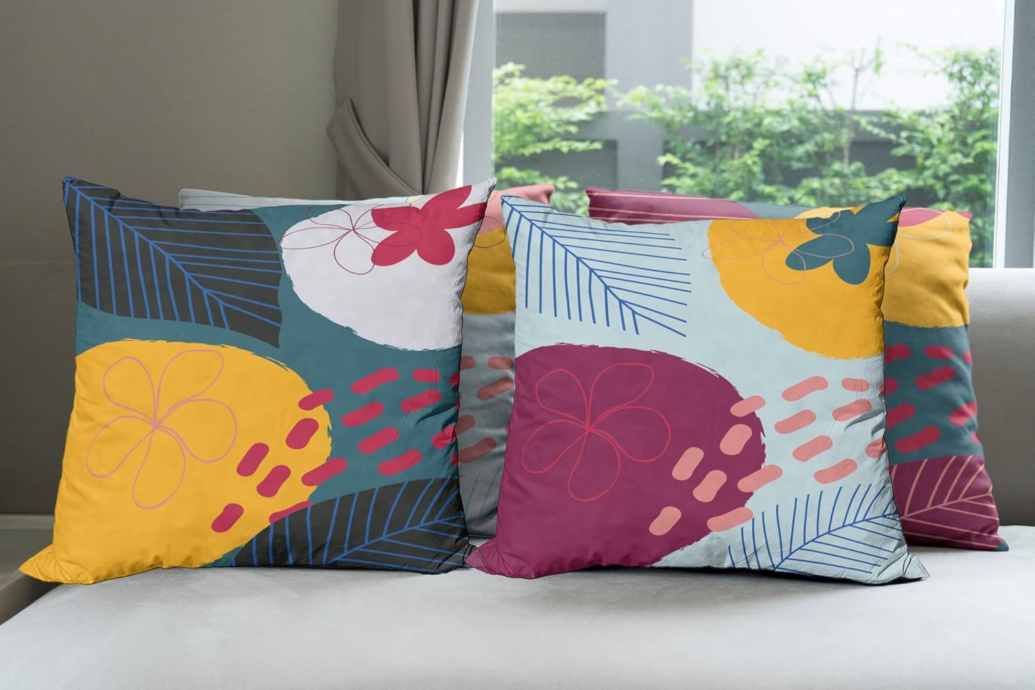 Ambesonne Floral Throw Pillow Cushion Case Pack of 4, Hand Drawn Abstract Flower Ornaments on Baby Blue and Dark Teal Backdrops, Modern Accent Double-Sided Printing, 20" x 12", Marigold Raspberry
