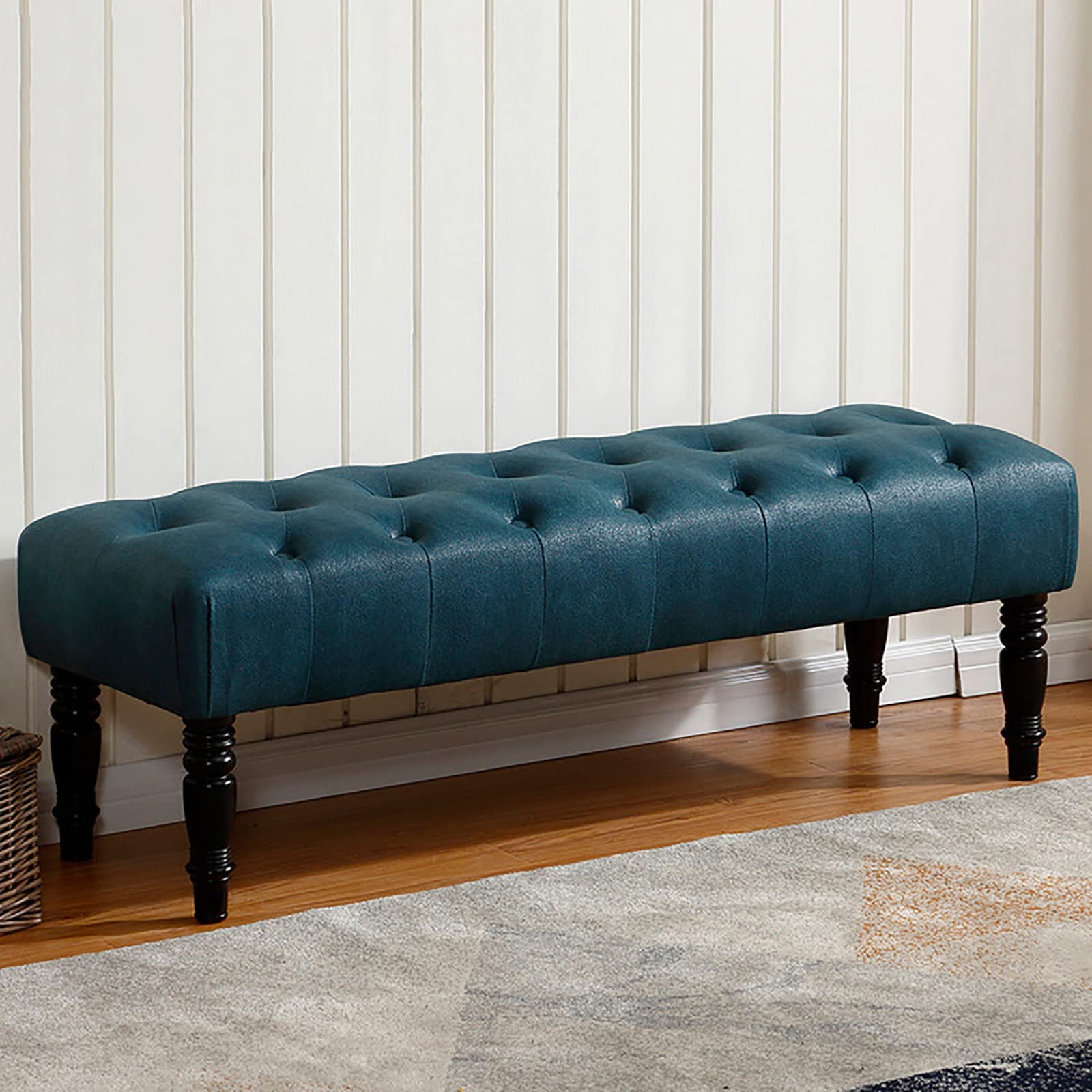 Tabouret de change en similicuir matelassé bleu marine et finitions bois noble