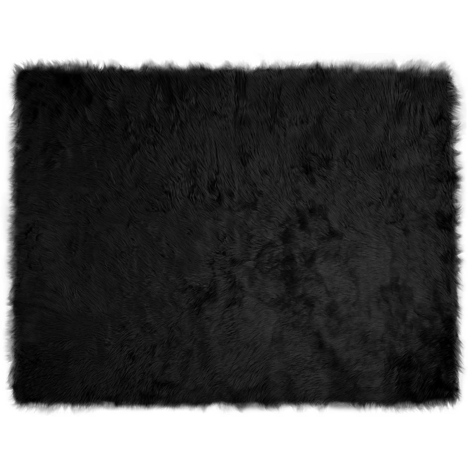 Tapis fausse peau de mouton noir au salon : créez un coin cocooning moderne et chaud avec Tafalla
