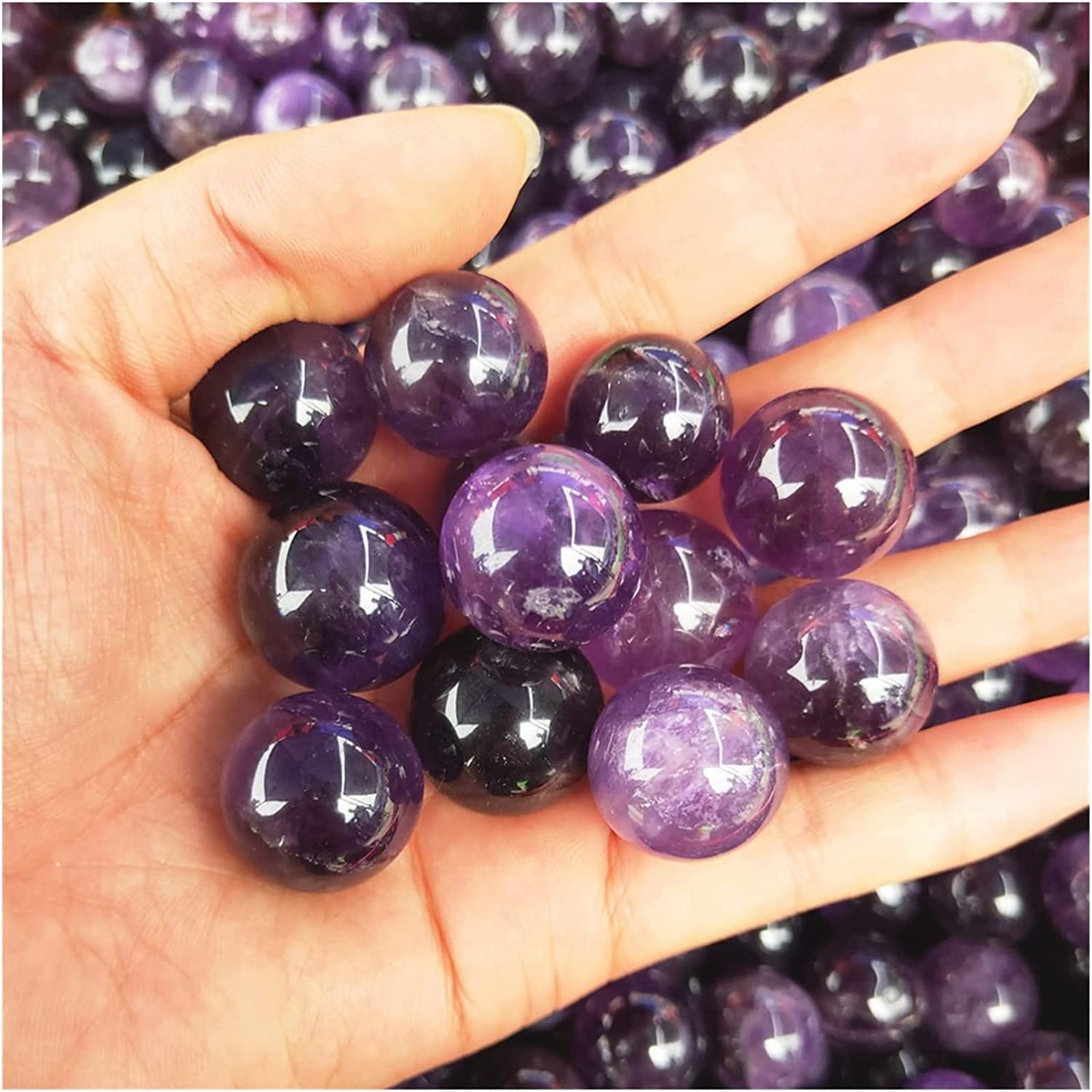 Amatista natural en bolas de piedra de color púrpura y esfera para curación y hogar