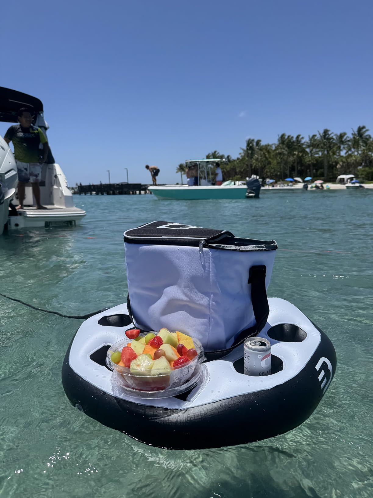 Customer photo of the DIVEBLAST floating cooler on a sandbar day