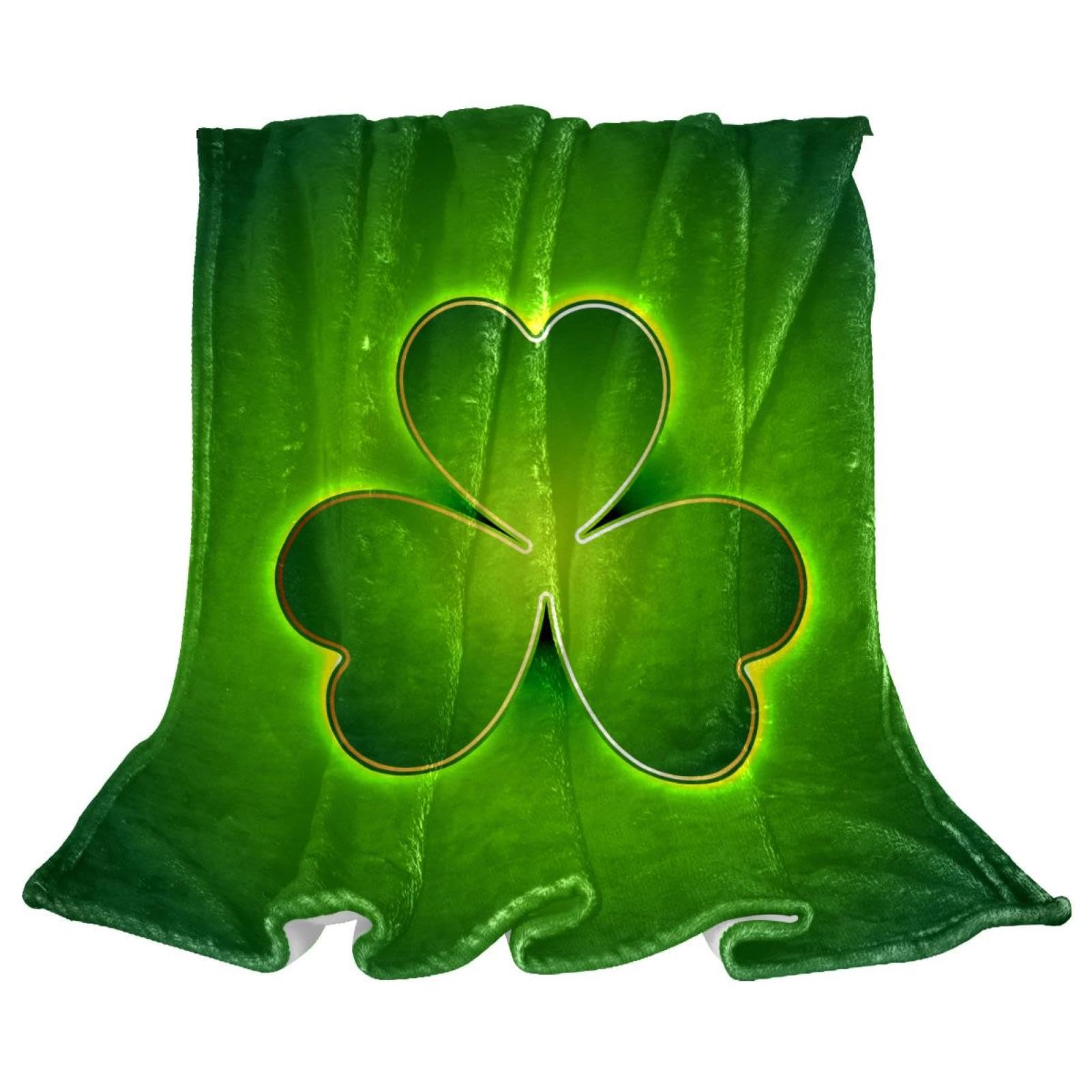 Couverture microfibre trèfle vert pour vos moments cocooning dans le salon