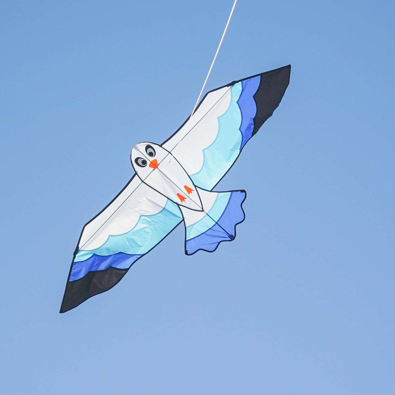 In the Breeze 3378 — 70-inch Blue Seabird Kite — Colorful, Easy-Flying, Single-Line Bird Kite; Kite Line Included…