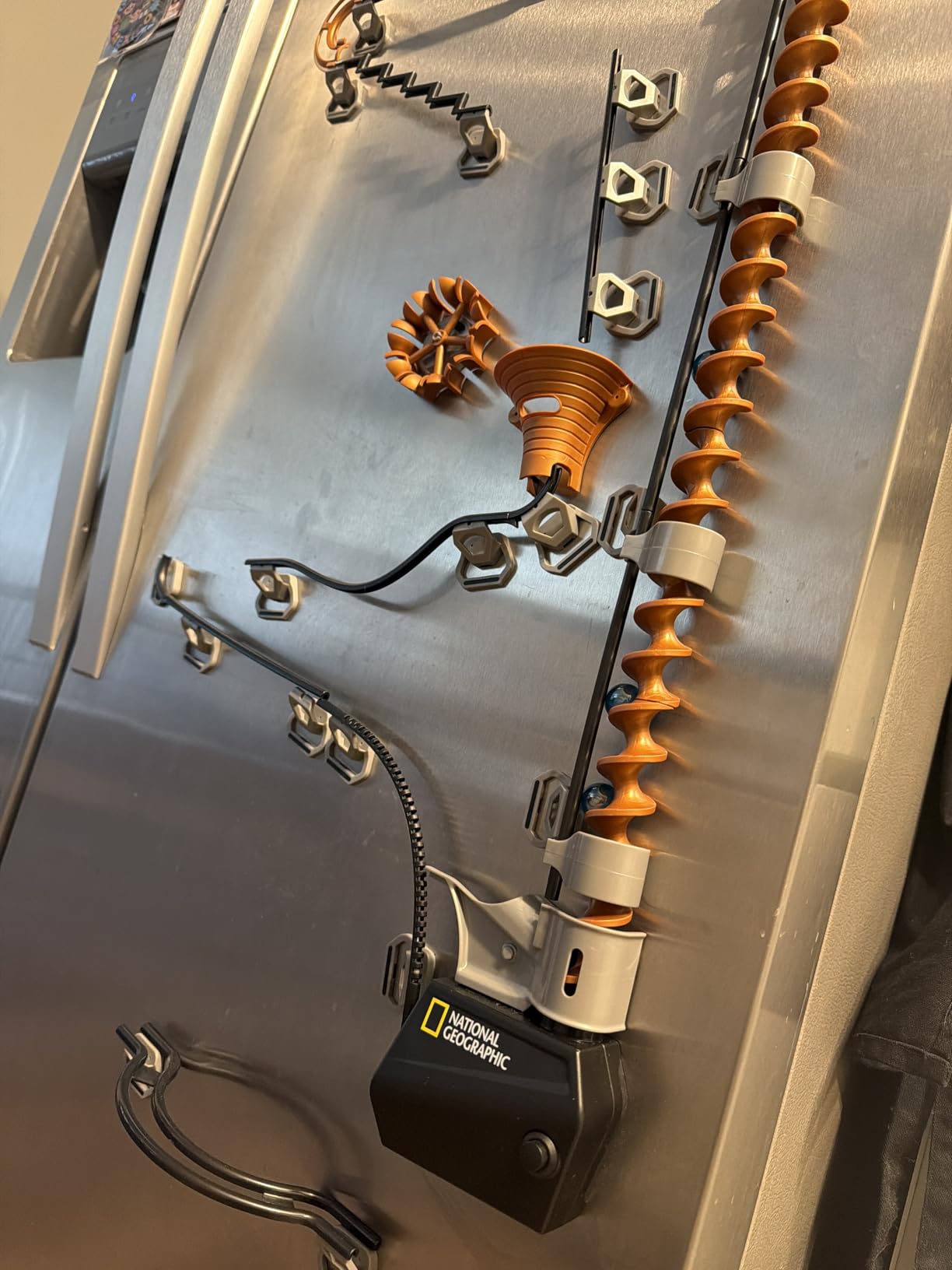 National Geographic Magnetic Marble Run showing an elaborate track configuration attached to a magnetic surface