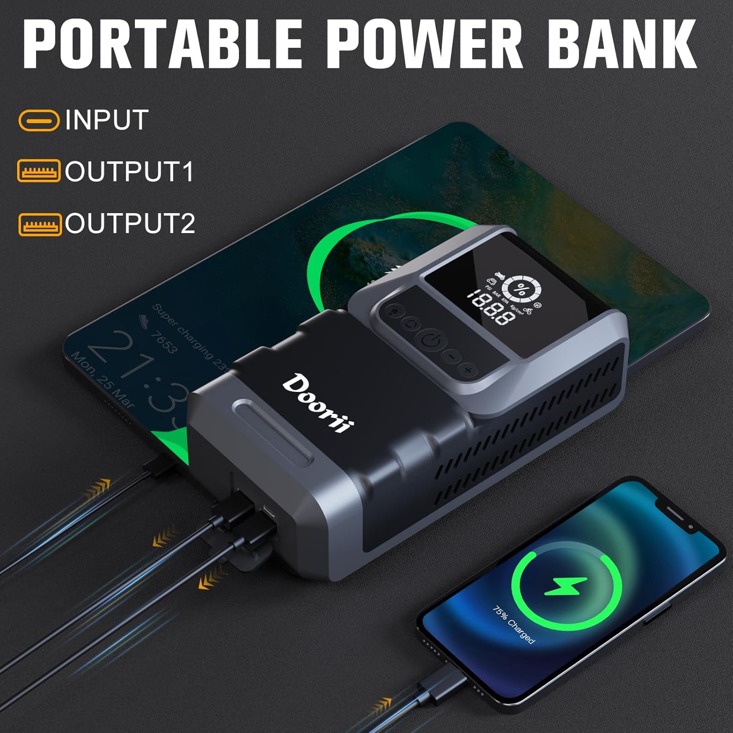 The Doorii jump starter functioning as a portable power bank, charging a smartphone and a tablet via its USB output ports.