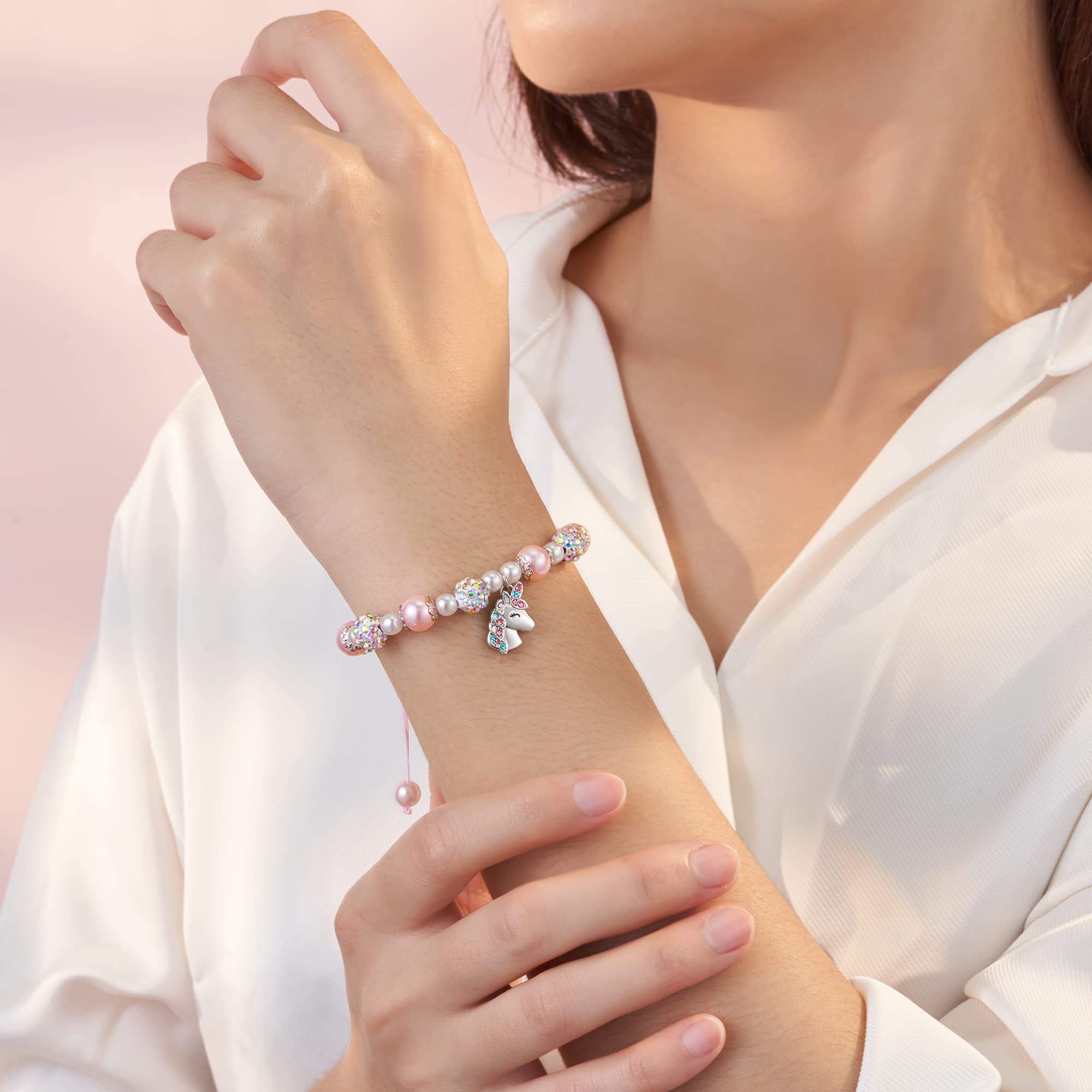 HGDEER Braccialetto con unicorno per figlia/nipote/nipote, con perle rosa e strass, lunghezza regolabile da 10,2 a 25,4 cm, in metallo, senza pietre preziose, 10 inches, Tessuto corallo Perla senza