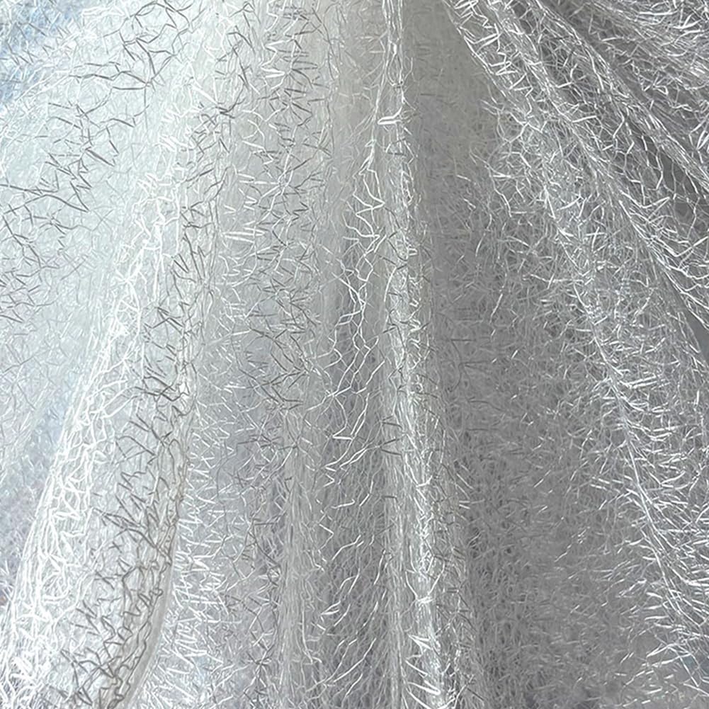 Tissu ajouré à maille irrégulière pour customiser vos vêtements et créer des décors blancs