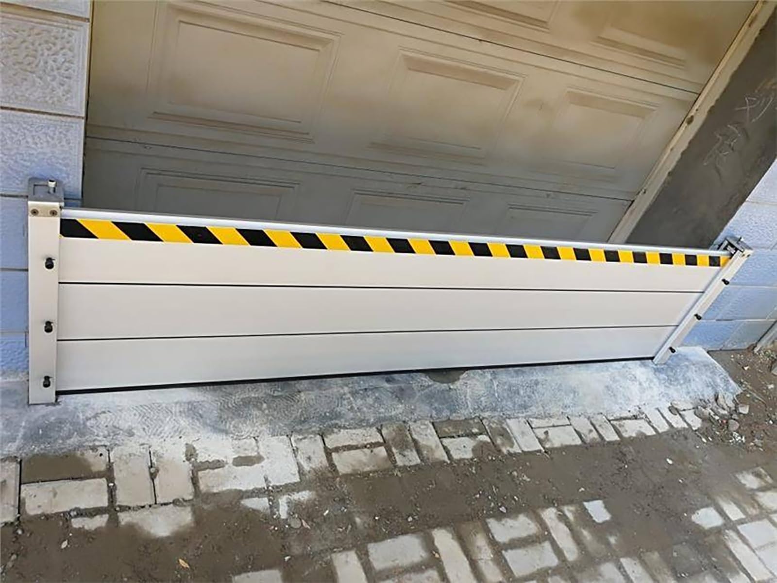 Barrière de protection contre les inondations pour entrée