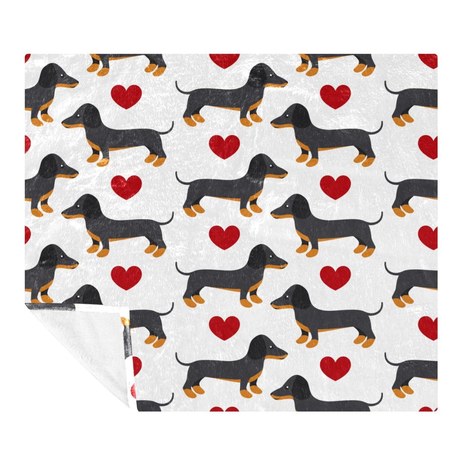 Couverture polaire teckel pour des moments cocooning sur votre canapé